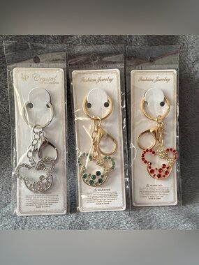 Fashion Jewelry & Crystal Collection Keychain/Bag Charm total of 3 items.